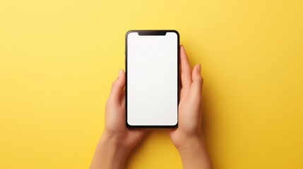 Hands holding a smartphone with a white screen on a yellow background