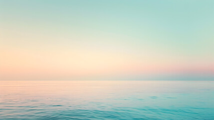 Fototapeta premium A calm ocean with a beautiful blue sky in the background