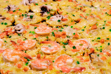 omelette with shrimp and seafood on street food market