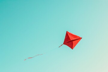 Red Kite Flying Against a Clear Blue Sky