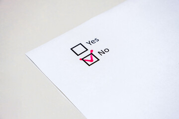 Check boxes no on white paper.