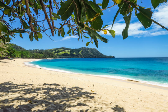 Kinunang white sand beach and the headland at beautiful Pulisan Resort, Pulisan, Minahasa Highlands, North Sulawesi, Indonesia, Southeast Asia, Asia
