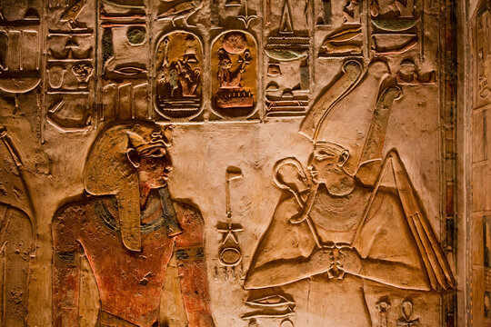 Pharaoh Seti I on left and God Osiris right, Bas Relief, Tomb of Seti I, KV17, Valley of the Kings, Ancient Thebes, UNESCO World Heritage Site, Luxor, Egypt, North Africa, Africa