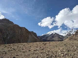 Breathtaking Views of Shimshal Pass in the Pamir Mountains. Shimshal Valley is a remote and breathtakingly beautiful area known for its high-altitude landscapes, rugged mountains, and more.