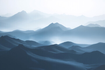 Fototapeta premium Mountains and hills hide in the mist on the horizon. Beautiful peaceful landscape about the freshness of morning meadows.