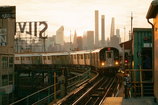 7 Train approaching at sunset, at Queensboro Plaza Station, Queens, New York