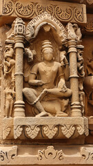 Fototapeta premium India, Madhya Pradesh, Sihoniya, Beautiful Carvings of Hindu Deities on the Kakanmath Temple, this 11th Century Monument Dedicated to Lord Shiva. 