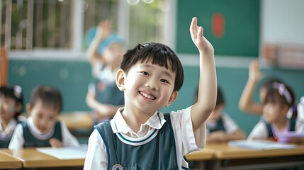 Smiling Boy Raises Hand in Classroom