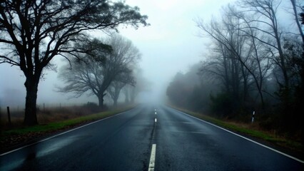 Deserted Road Leading into Fog