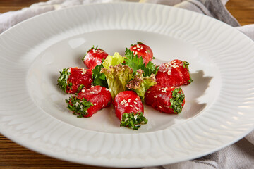 Baked Pepper Appetizer with Fresh Lettuce and Sesame Seeds - Elegant Plated Starter