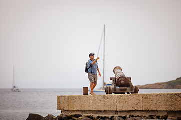 Solo man traveling in Corsica, France, on the mediterranean sea. 