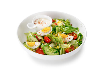 Healthy green summer salad with boiled egg, cucumber and corn. isolated on white background