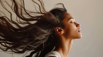 Women flipping their hair in a studio, showcasing dynamic movement and fun