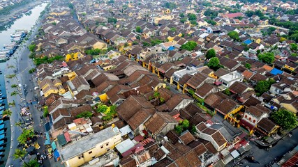 Aerial view of Hoi An's ancient town with traditional Vietnamese architecture, ideal for cultural...