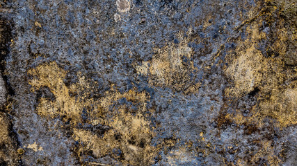 Close-up of weathered, textured wall surface evoking abstract art concept, symbolizing the effects of time and decay