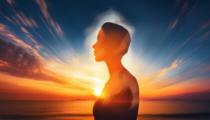 Fototapeta premium A woman's silhouette is blended with a sunset sky, creating a surreal and colorful portrait.