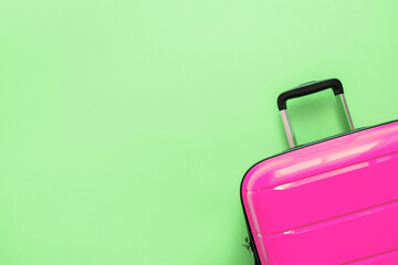 Suitcase on color background. Travel concept. Happy Holidays, vacation.