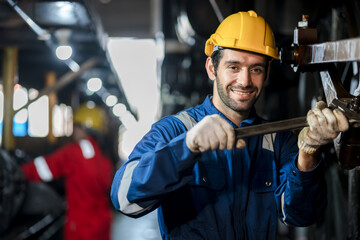 Engineer checking construction process railway and checking work on railroad station . Railway engineer checking machines in train station. Train engineer concept