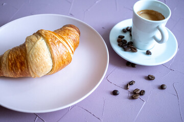 cup of coffee and croissant	
