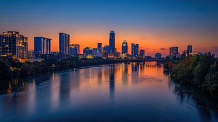 Austin Skyline with City Lights Reflected in Water at Dusk