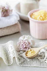 Bowl of yellow sea salt.