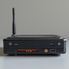 Detailed close-up image of a wireless internet router showcasing its various connectivity ports and external antenna against a neutral background