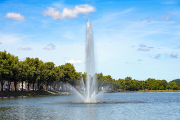 Large fountain on the city lake Pfaffenteich, one of the seven lakes in Schwerin, tourism and...