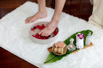 Man indulges in blissful foot massage at luxurious spa salon while masseur give reflexology therapy in gentle day light ambiance resort or hotel foot spa. Quiescent