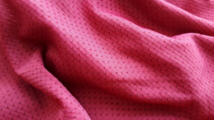 Burgundy linen jersey. Matte knitted fabric in burgundy color. Texture of knitted fabric. Textile...