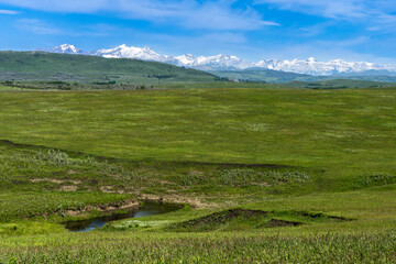 The Rocky Mountain Foothills landscape view from highway 22 south of Calgary