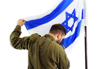 Israeli soldier kisses the flag of Israel on the white background
