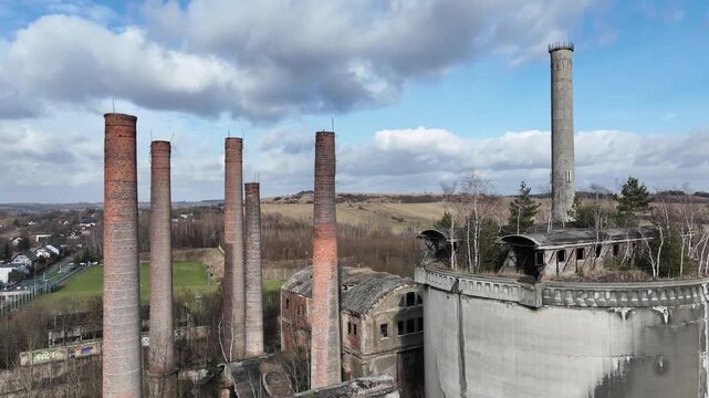 Aerial drone view of an old cement factory. Abandoned cement factory entered into the register of monuments. Grodziec Cement Plant, Bedzin, Poland.