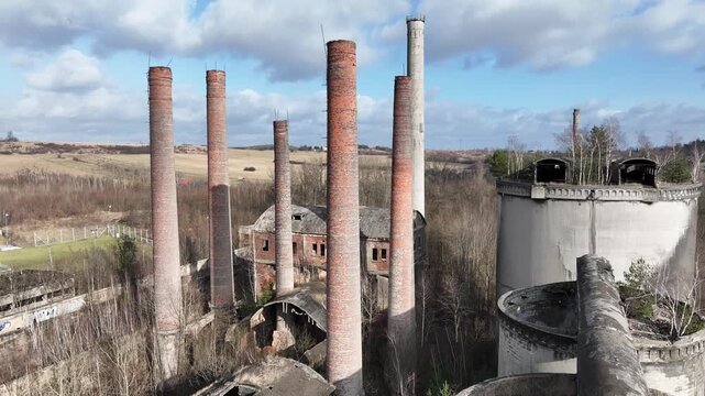 Aerial drone view of an old cement factory. Abandoned cement factory entered into the register of monuments. Grodziec Cement Plant, Bedzin, Poland.