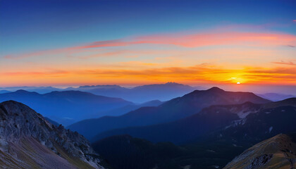 Fototapeta premium Colorful sunset in the mountains. View from the top of the mountain.