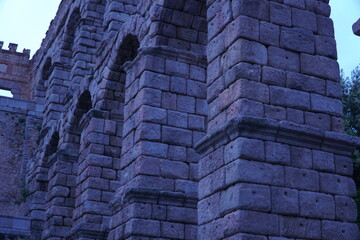 Exploring the ancient roman aqueduct in Segovia during serenity