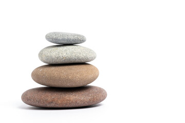 Stack of pebbles isolated on white background. Zen concept.