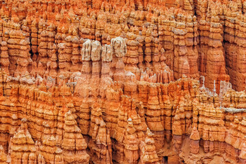 Dramatic Orange Rock Formations Towering Above the Canyon Floor in Bryce Canyon National Park