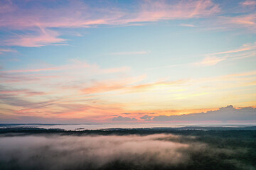 Boothbay Harbor West at sunset in Summer with a foggy mist aerial drone