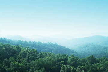Fototapeta premium a view of a mountain range with trees, gradient from green to blue, evoking images of lush forests and clear skies