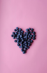 colorful fruits and berries on pastel background