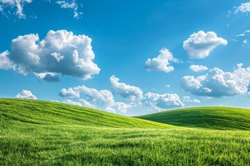 Tranquil panoramic landscape of lush green hills under a serene blue sky with fluffy white clouds