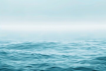 Naklejka premium Serene ocean background with light blue water waves, calming sea surface photography