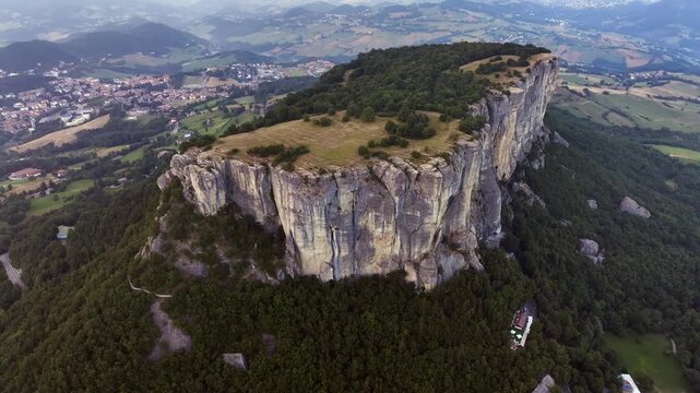 Aerial view of Bismantova Rock at sunset, Pietra di Bismantova, located near to Castelnovo Monti, Reggio Emilia, Italy