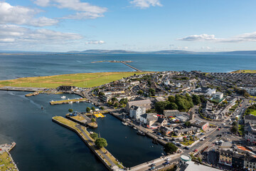 Aerial photograph of Claddagh in a sunny day, featuring the Claddagh basin, park and residential area.