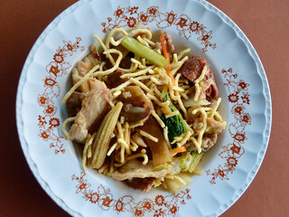 A closeup of delicious Chinese combination chow mein on the table. 
