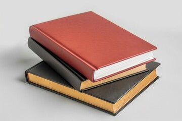 Three books stacked on top of each other, a compact and neat arrangement