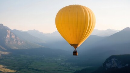 Fototapeta premium A person riding a hot air balloon over a scenic valley 