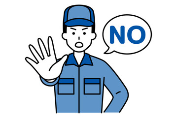 右手を前に出してNOと言うつなぎ作業服の男性