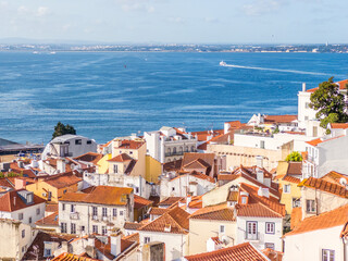 Fototapeta premium Alfama lighted by the morning sun