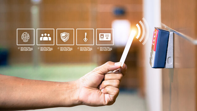 Hand scanning proximity ID card on reader access control system for door unlock with security icons for identity or verification identify for safety detect fingerprint scan or check attendance.